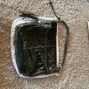 Dark green Brighton purse.